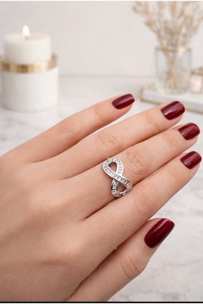 VEGALUXE Steel Infinity Ring with Zircon Stone, Non-Tarnish, Adjustable to Fit Finger