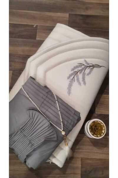 Gerenic Prayer set: embroidered prayer rug, pleated sheet, and Quran cover
