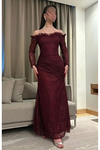 Masha Mashaeil ~ A beautiful, stunning, and very striking evening dress in a shimmering burgundy lace color.