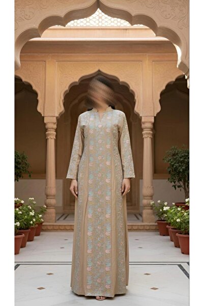 ISHRAQAT AL-AMAL Elegant, fully embroidered cotton jalabiya with long, embroidered sleeves, perfect for special occasions.