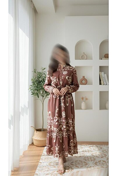 ISHRAQAT AL-AMAL Long dress (one size, free size) with long sleeves, elasticated cuffs, and front buttons.