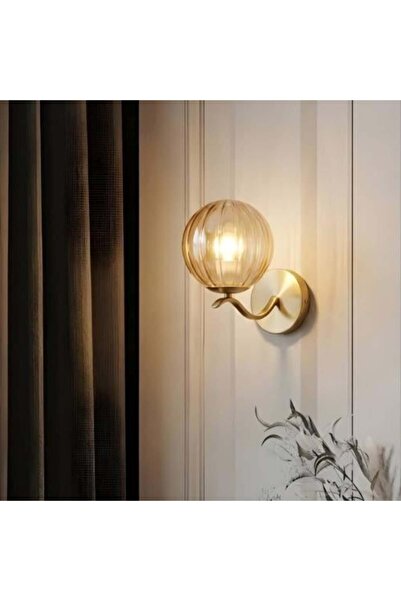 BAB Modern gold wall lamp with a honey-colored glass ball