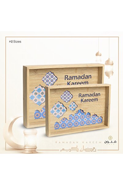 WOOD A set of two wooden serving trays with a glass base and decorative Ramad...