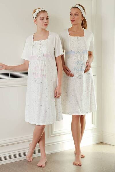 Stylish Elegant maternity dress adorned with buttons and a soft bow in pink