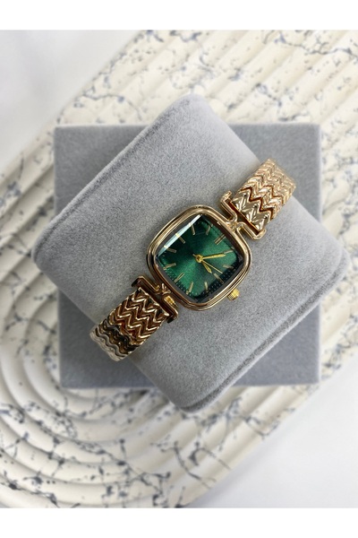 Mazzy ساعة يد نسائية ذهبية اللون مع خلفية خضراء