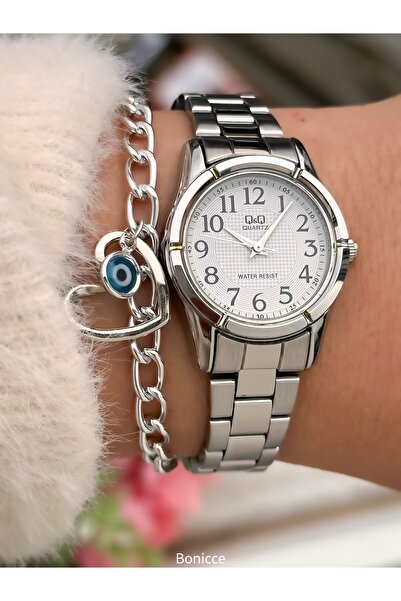 Q&Q Silver Colored Small Case - Steel Cord Evil Eye Beaded Bracelet Wristwatch