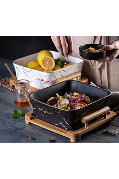 cc bin shihon Black marble ceramic salad bowl with a wooden base and 2 wooden spoons