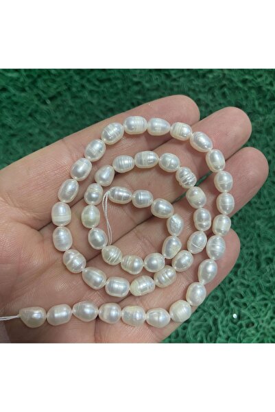 TAŞ UZMANI لؤلؤ طبيعي بيضاوي 6 ملم