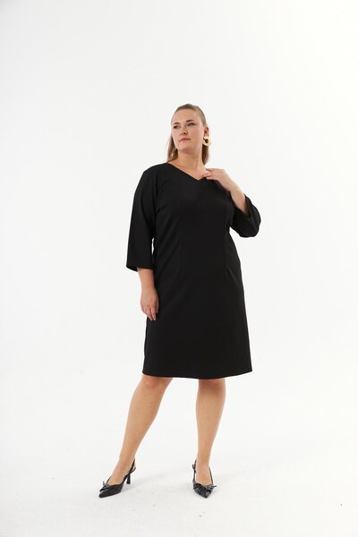 RMG Plus size v-neck dress with stone detail on shoulder black