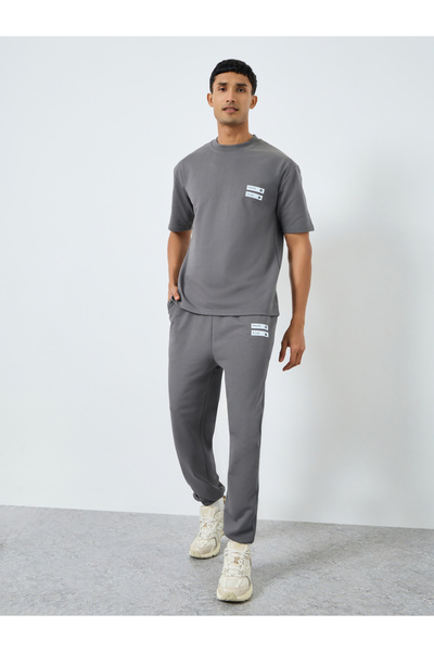 Styli طقم رجالي مكون من تيشيرت بأكمام قصيرة قصة فضفاضة وبنطال رياضي