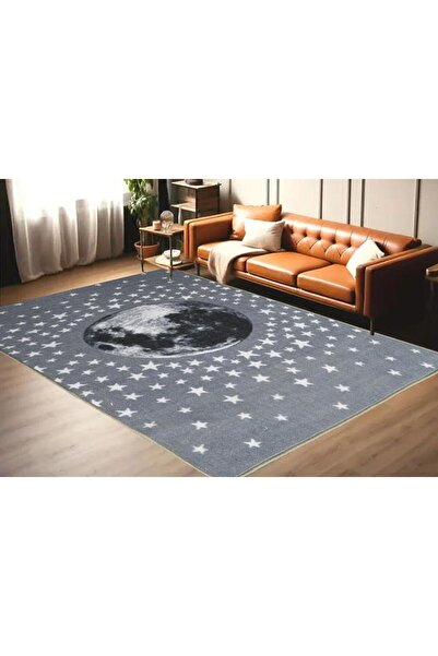 Or A rug decorated with a multi-colored moon and stars print, 100 x 150 cm