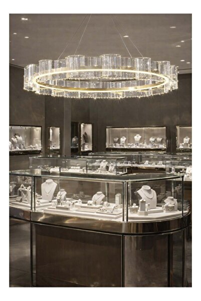 qwell Modern circular chandelier in olive gold with LED technology