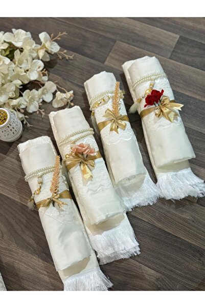 Roz Box of carpets + sheet + prayer beads