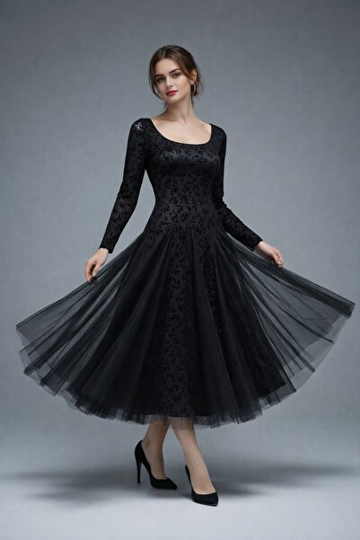 LAFYNA A stunning black evening dress with long sleeves and a voluminous tull...