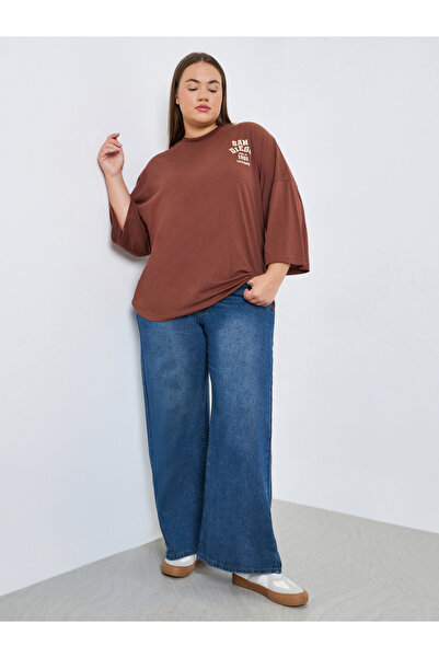 Styli Plus Size Wide Leg Faded Jeans