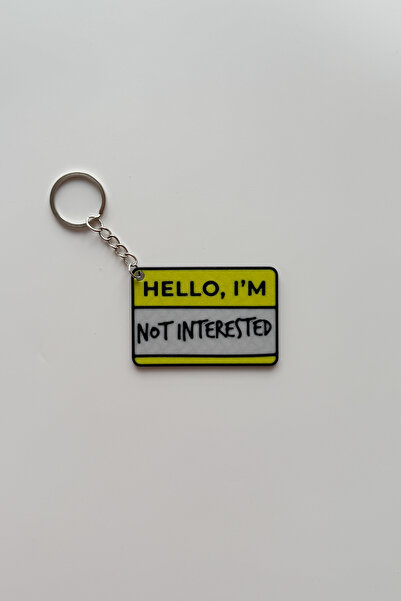 sin istanbul سلسلة مفاتيح فضية بتصميم "لا أهتم"