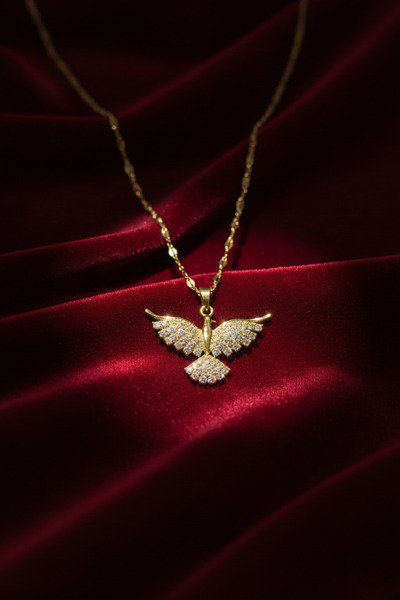 honarys Küllerinden Doğuşun Simgesi: Zirkon Taşlı Zümrüdüanka Kolye