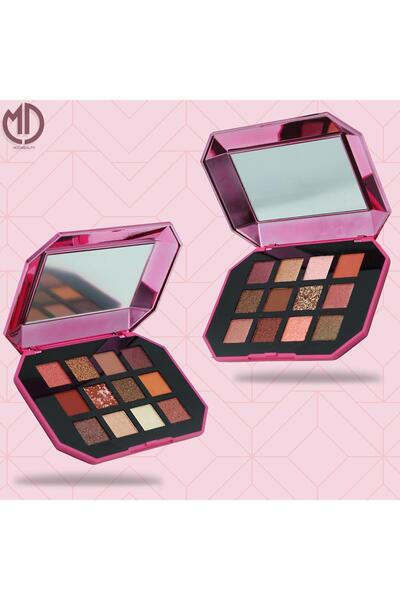 Moda Beauty A collection of multi-colored eyeshadow palettes with a fantastic...