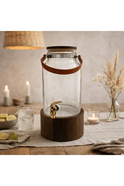 Vi Markets A stylish beverage dispenser made of clear glass with a wooden bas...