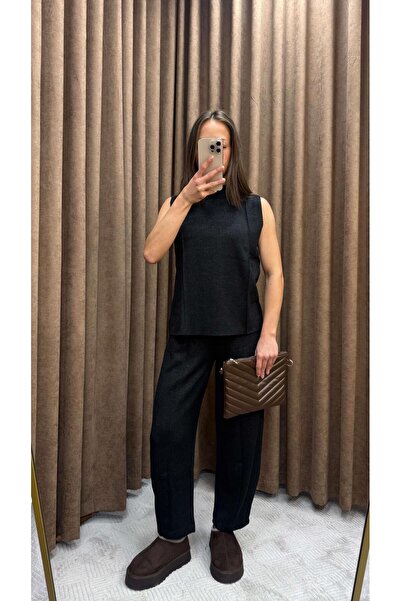 Maysa بدلة سوداء بياقة قائمة وتفاصيل لامعة