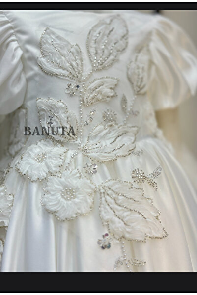 Banuta Queen's dress, a girl's evening gown with floral trim