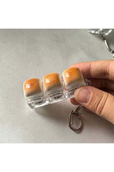 Choice سلسلة مفاتيح بتصميم خبز الكراميل بثلاثة مفاتيح لتخفيف التوتر، مزودة بأ...