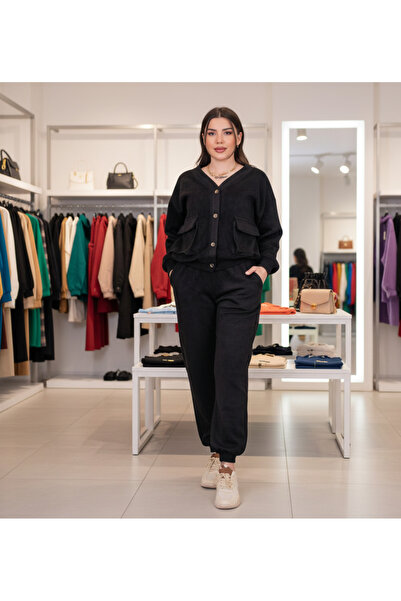 MQ Women's long-sleeved jacket with pockets and buttons in a distinctive soli...