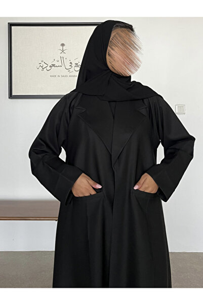 OLGA-ABAYA A modern and elegant abaya from Olga with pockets, made of crepe L...