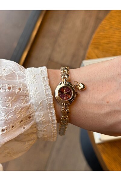 HOUSEKİ ساعة نسائية بسيطة من كاريل تشارم بمينا باللون العنابي