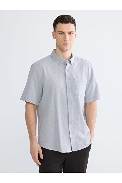 LC Waikiki قميص رجالي من نوع ديربي بقصة عادية من إنديجو