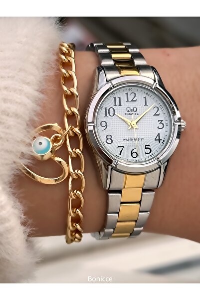 Q&Q حزام فولاذي من العلامة التجارية، مقاوم للماء، هيكل صغير ذهبي اللون، ساعة ...