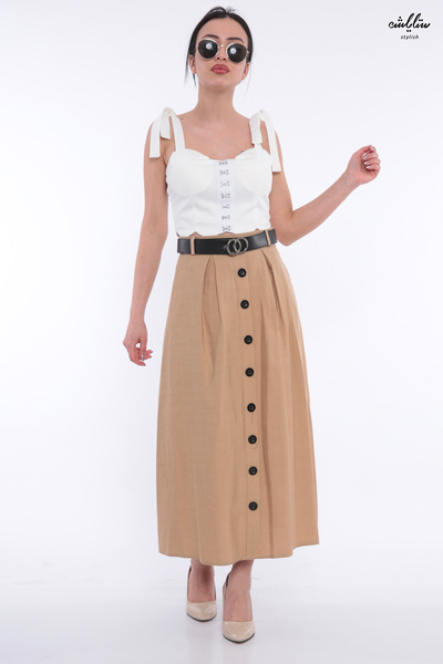 Stylish An elegant light brown skirt adorned with buttons and a stylish belt