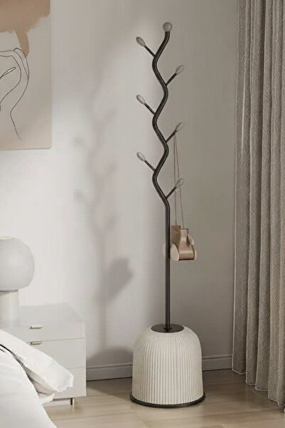 Generic Versatile floor stand for accessories, bags, and clothes; stylish tree design.