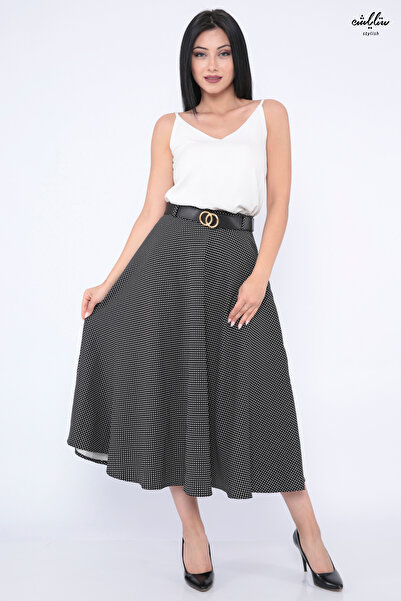 Stylish A wide and elegant black midi skirt with a polka dot design for a stu...