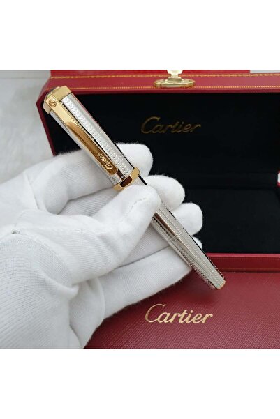 Cartier Cartier Louis gold pen with geometric patterns and cufflinks