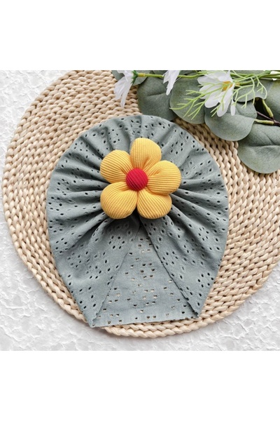 Superbaby Khaki turban hat with openwork pattern and applied flower