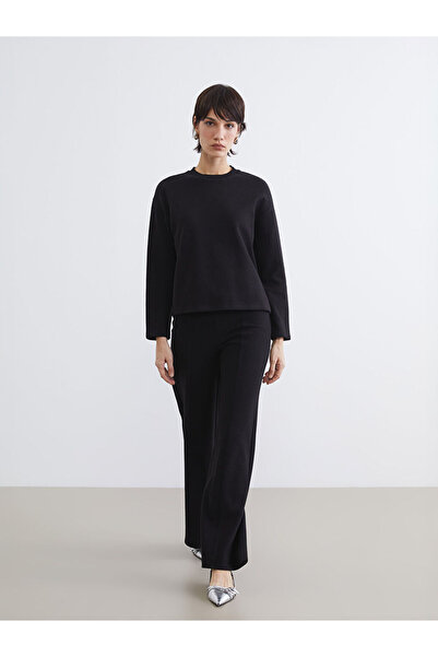 LC Waikiki بنطلون نسائي أسود بخصر مطاطي وواسع الساق