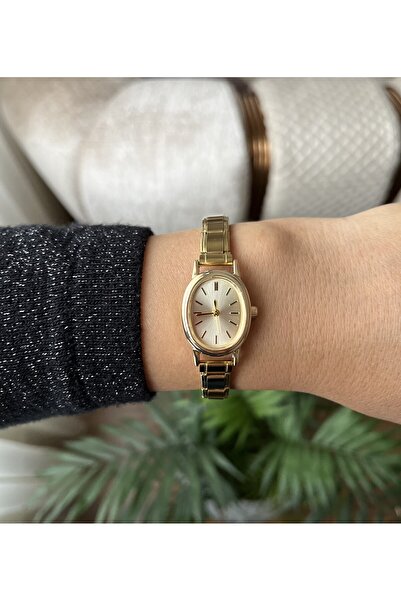 baymami İtalyan Nomi Charm Model Gold Kadın Kol Saati