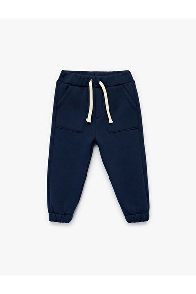 Koton Fleece-Lined Navy Blue Baby Boy Sweatpants with Tie-Up Waist and Pocket...