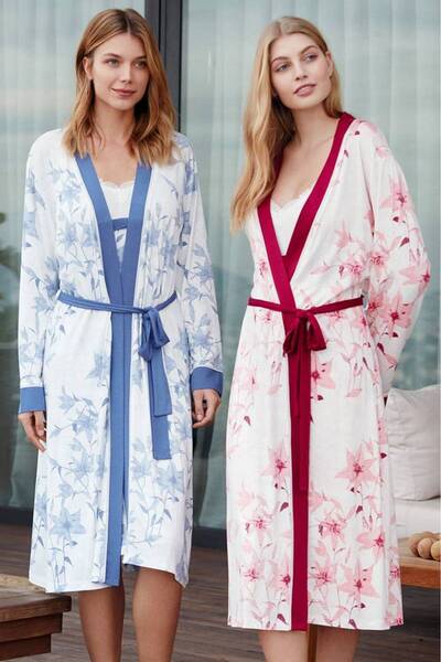 Stylish A soft, blue women's house robe with long sleeves and a waist belt fe...