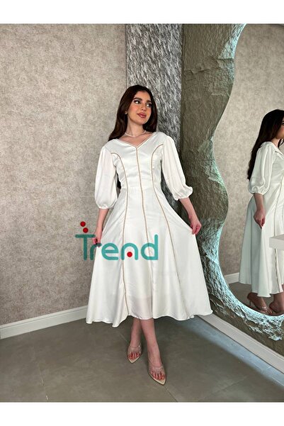 TREND White dress with gold trim