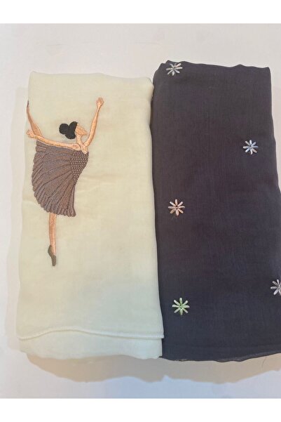 Veil Designer A set of two headscarves, one white and one navy, with white an...