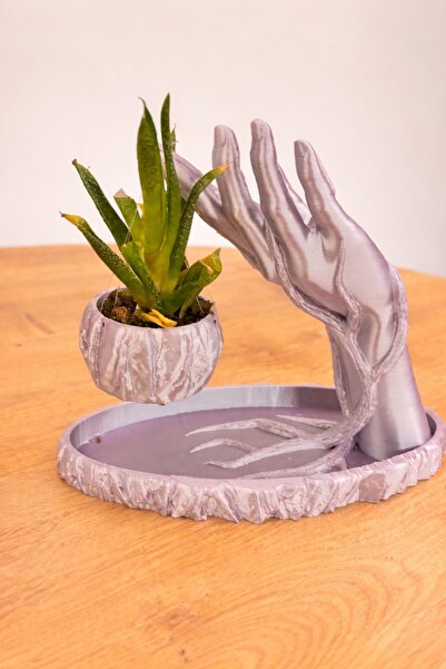 sedua el saksısı Modern ve sanatsal tasarımıyla dikkat çeken el figürlü dekor...