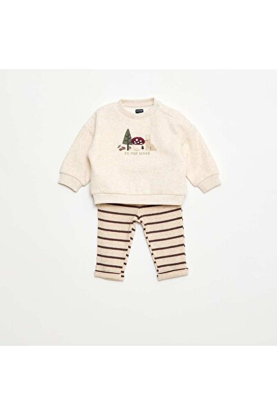 KIABI طقم سويت شيرت وبنطال ضيق برسوم متحركة، لون بيج