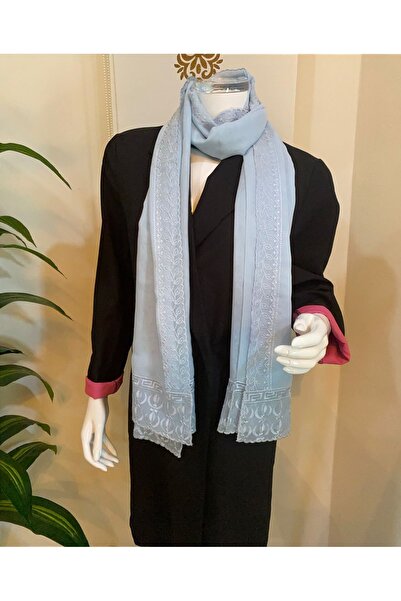 Veil Designer A sky-blue voile headscarf with embroidery on three edges, made...