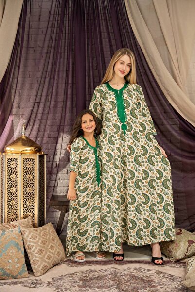 AFandina This mother and daughter jalabiya is distinguished by its exquisite ...