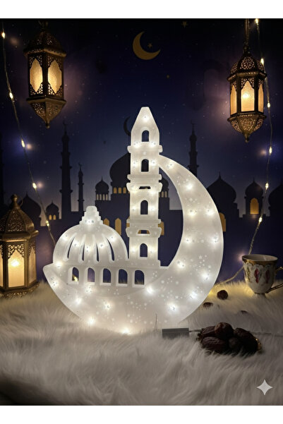 Modern shop A white plastic model in the shape of a mosque and crescent moon,...