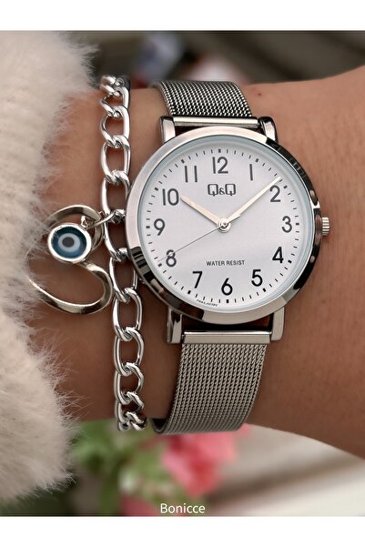 Q&Q ساعة نسائية أنيقة للهدايا - قرص صغير أبيض، سوار فولاذي فضي اللون، سوار معصم