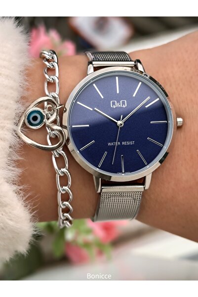Q&Q ساعة نسائية أنيقة ذات علبة كبيرة - سوار فولاذي شبكي باللون الأزرق الداكن ...
