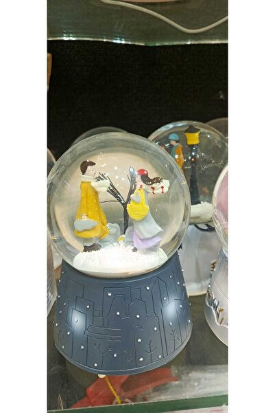 Trademark Fine Art This is a musical, light-up snow globe with a "Romantic Lo...